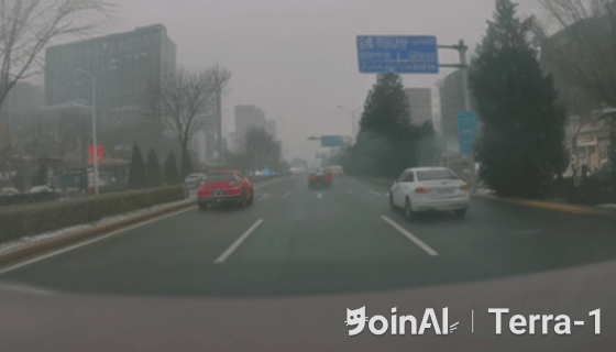 striJoinAI Terra generated video frame showing a daytime road scene 6 with multiple vehicles on a foggy day.